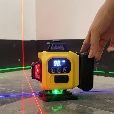 Niveau laser boitier jaune vue des lignes de couleur dans une pièce