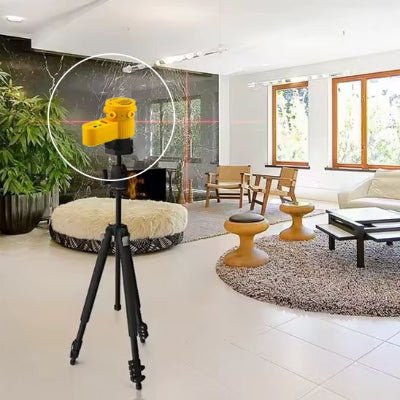 Niveau laser installé sur un trépied pour photo