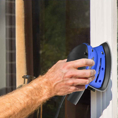 Ponceuse de détail utilisée sur peinture extérieure