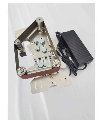 Ponceuse electrique a bande 360W vue du dessus avec table de support