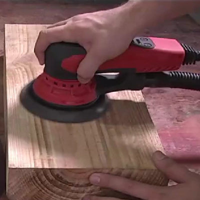 Ponceuse électrique orbitale utilisation bois brut