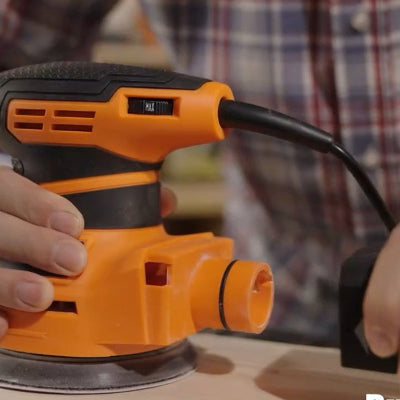 Ponceuse orbitale electrique orangeboîte poussière déconnectée