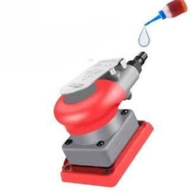 Ponceuse pneumatique carrée et vue d'une petite fiole d'huile