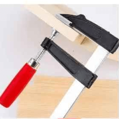 Serre joint menuisier noir poignée rouge